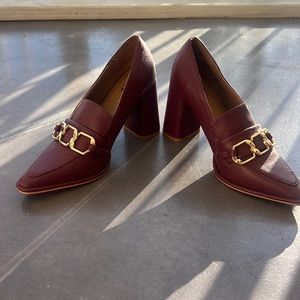 Cute gold chain link front heeled loafers. Worn on carpet :)